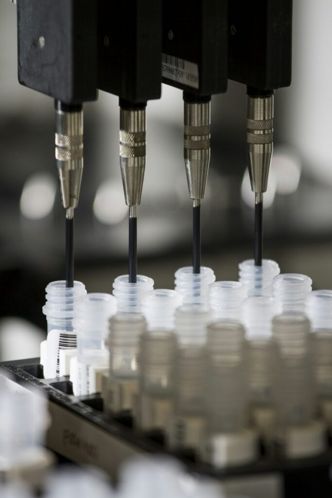 Automated liquid handler pipetting samples for high-throughput screening